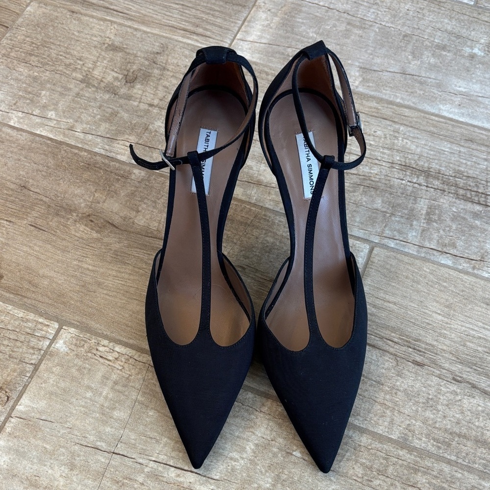 Tabitha Simmons black T-strap stiletto pumps.